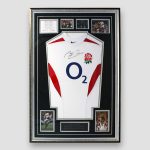 England Rugby 2003 World Cup shirt signed by Martin Johnson underneath O2 Logo