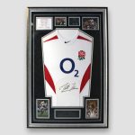 England Rugby 2003 World Cup shirt signed by Martin Johnson above O2 Logo