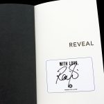 Robbie-Williams-Reveal-Signed-Copy-inside