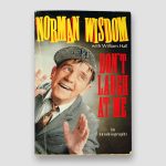 Norman-Wisdom-signed-autobiography-‘Don’t-laugh-at-Me’.-Paperback-book