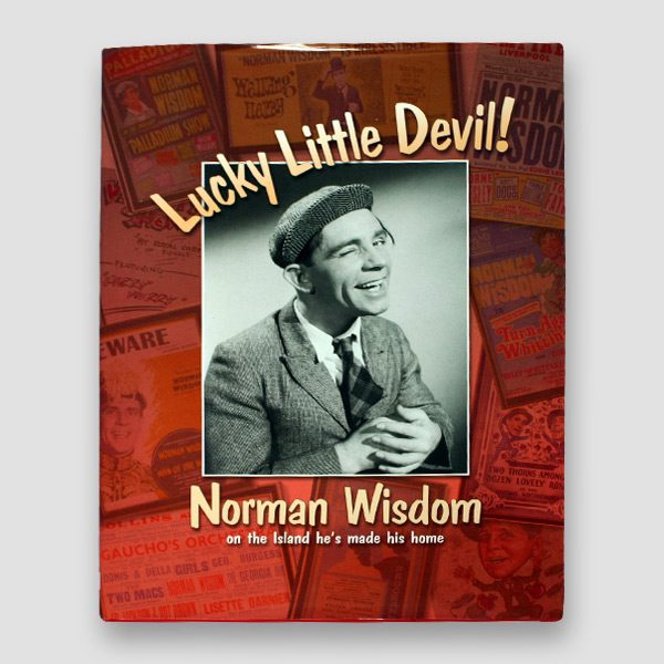Sir Norman Wisdom Signed ‘Lucky Little Devil’ Hardback Book