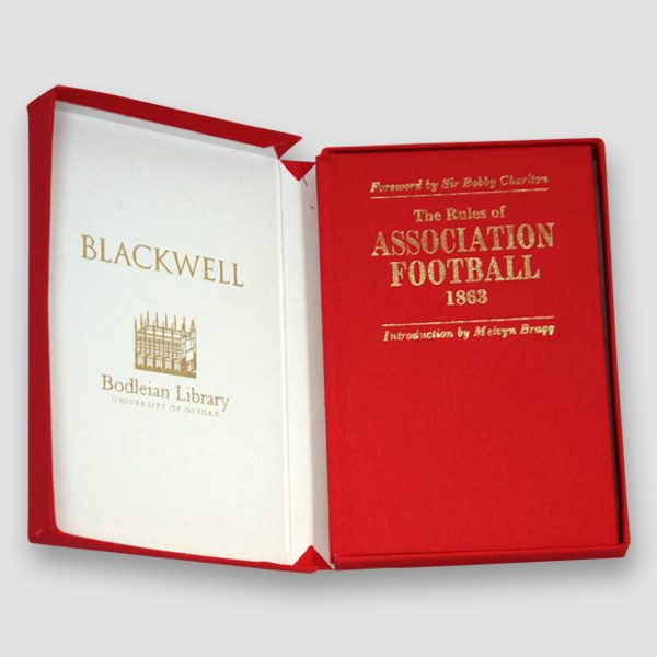 The Rules of Association Football 1863 Book Signed by Sir Bobby Charlton and Melvyn Bragg