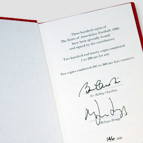 The Rules of Association Football 1863 Book Signed by Sir Bobby Charlton and Melvyn Bragg