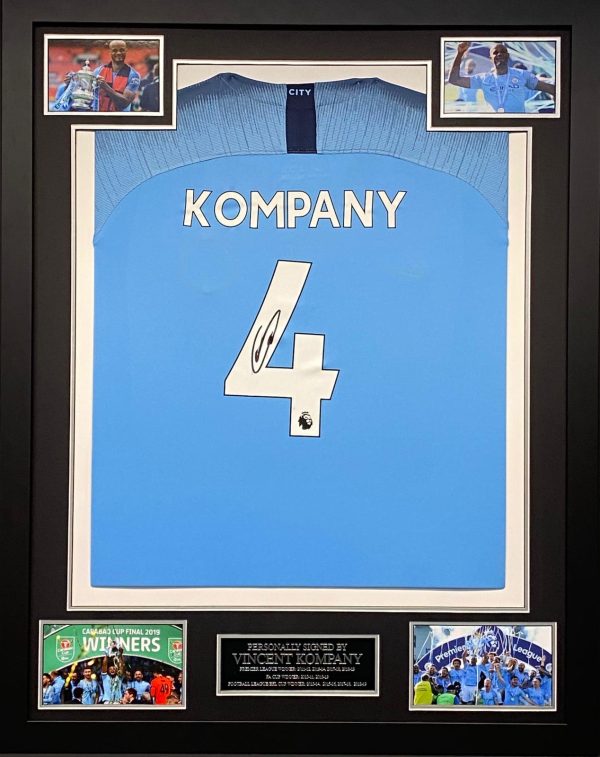 Manchester City shirt signed by Kompany , professionally framed