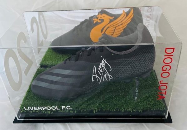 Black Football boot in a quality display signed by Diogo Jota