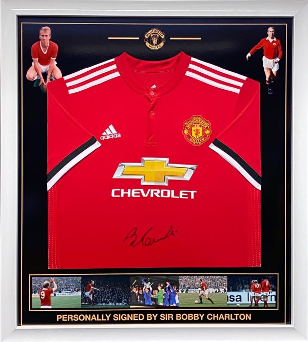 Manchester Utd shirt signed by Sir Bobby Charlton  , Professionally framed